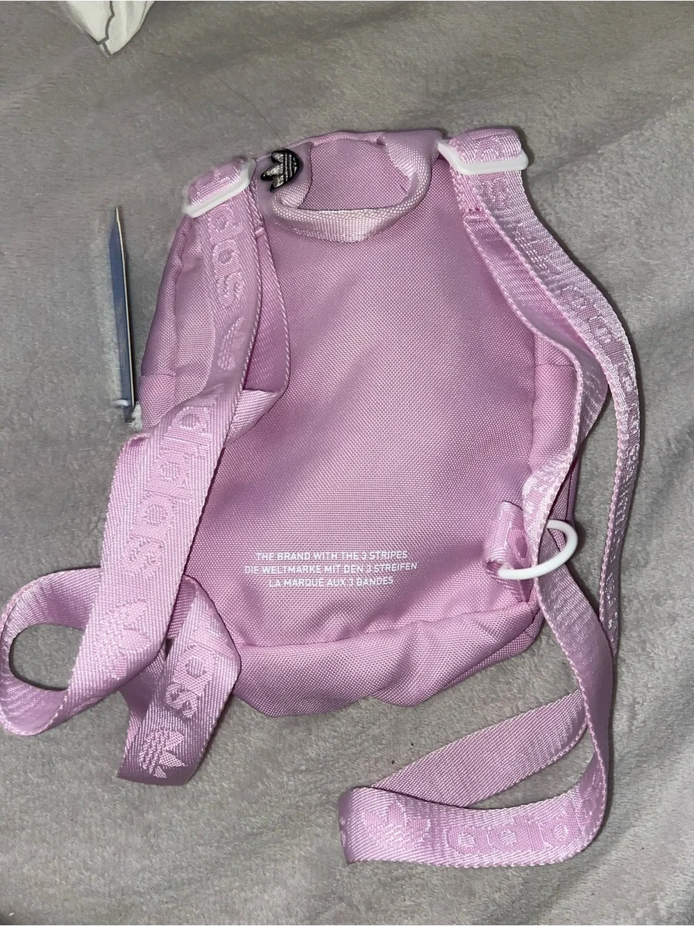 Pink mini crossbody backpack